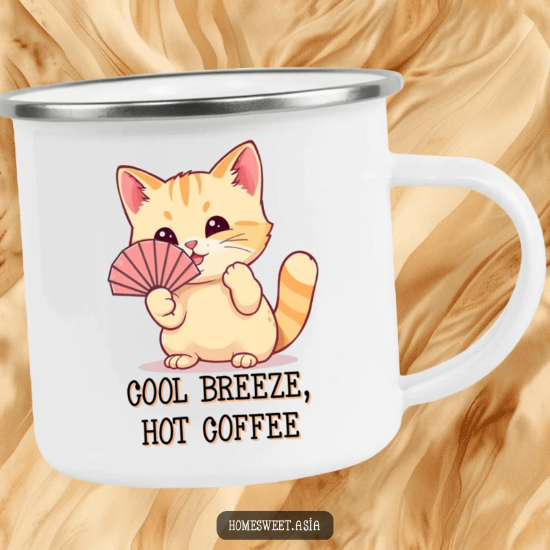 Funny cat wearing a tiny fan, playfully waving it with its paw, enamel camping mug, rugged, cute design, funny gift.