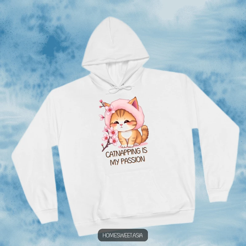 Funny, cozy hoodie depicting a cat with a soft fur hat, pausing to sniff a delicate cherry blossom in bloom.